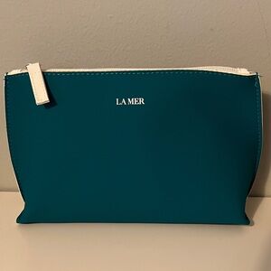 La Mer Teal Cosmetic Pouch with White Trim and Zip